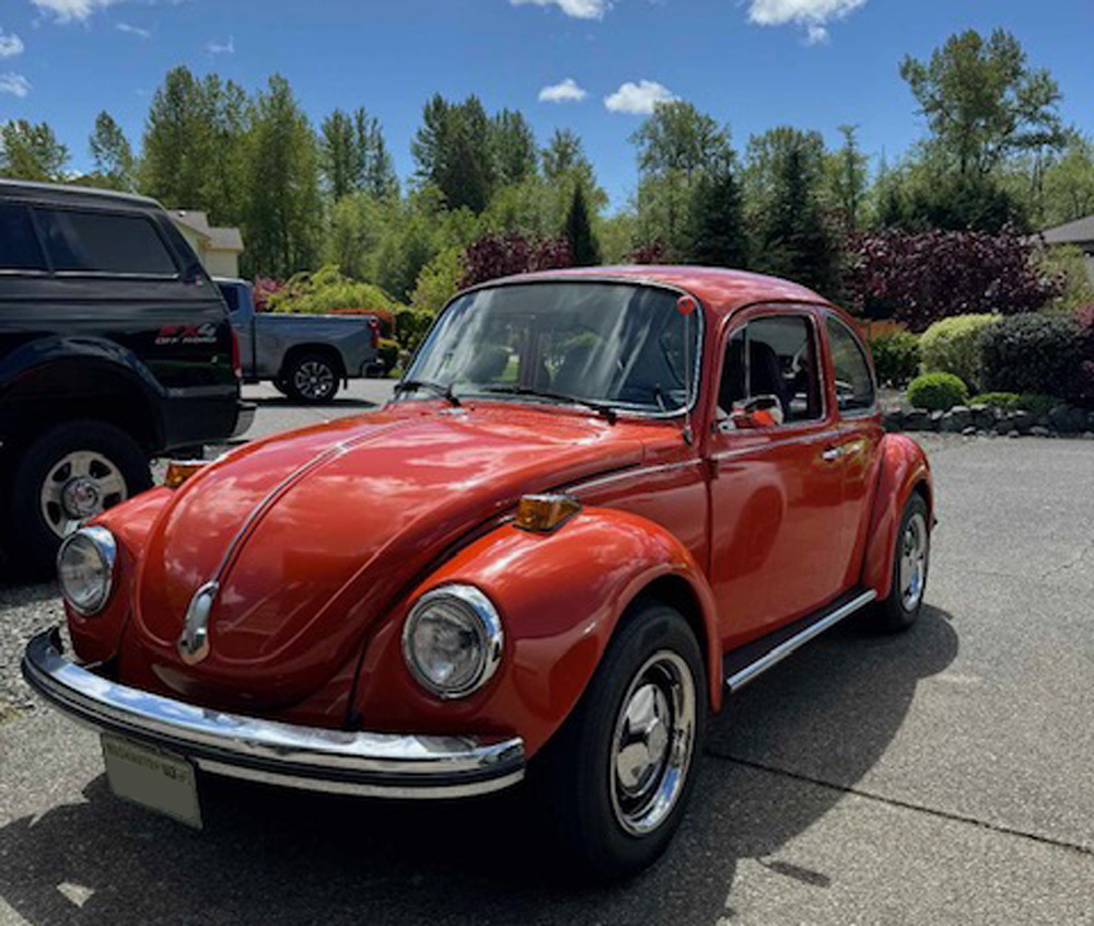 1303 Volkswagen Super Beetle in bright orange