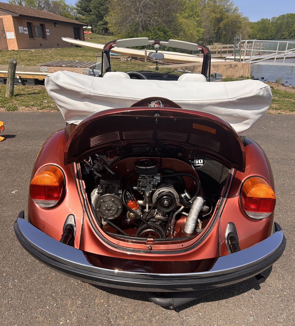 Underside of 1978 Super Beetle showing engine sump and driveshafts
