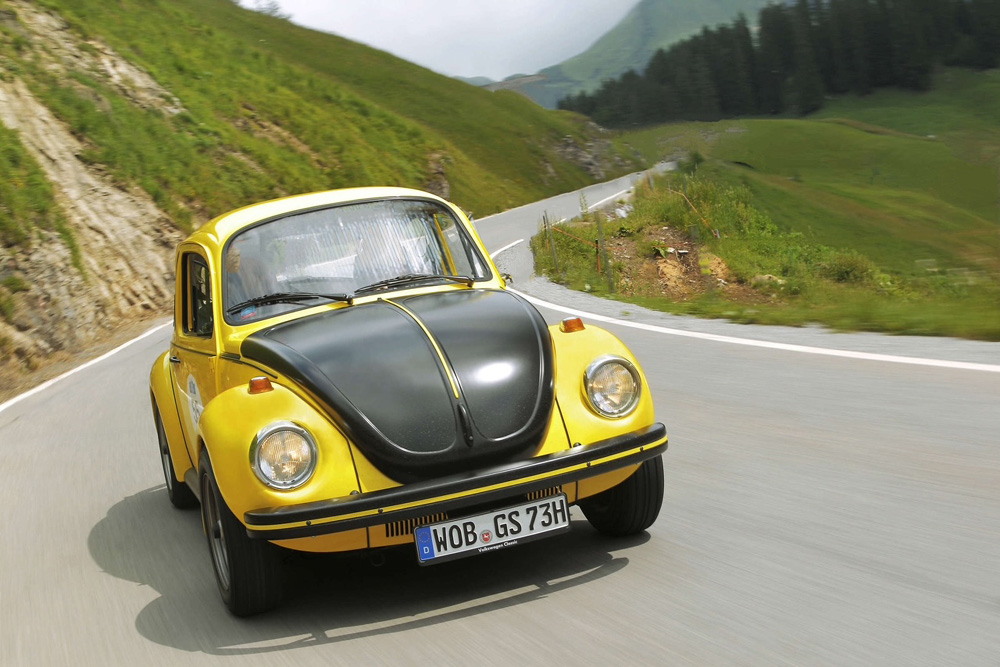 The Yellow and Black Racer speeds by